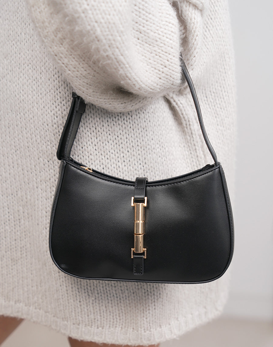 Sac pochette femme noir en similicuir avec fermeture dorée aimantée élégante