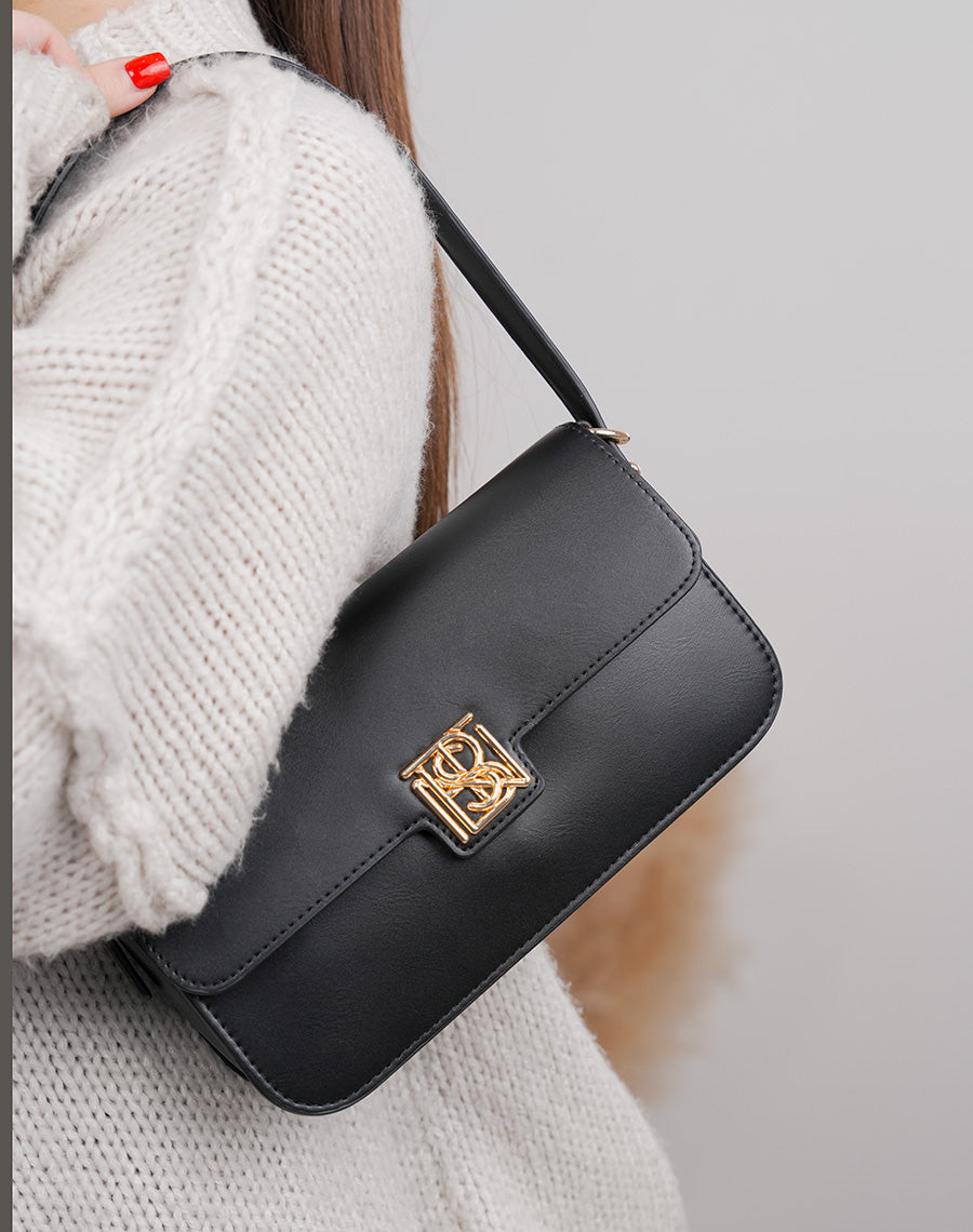 Sac pochette noir en similicuir avec détail doré et fermeture aimantée