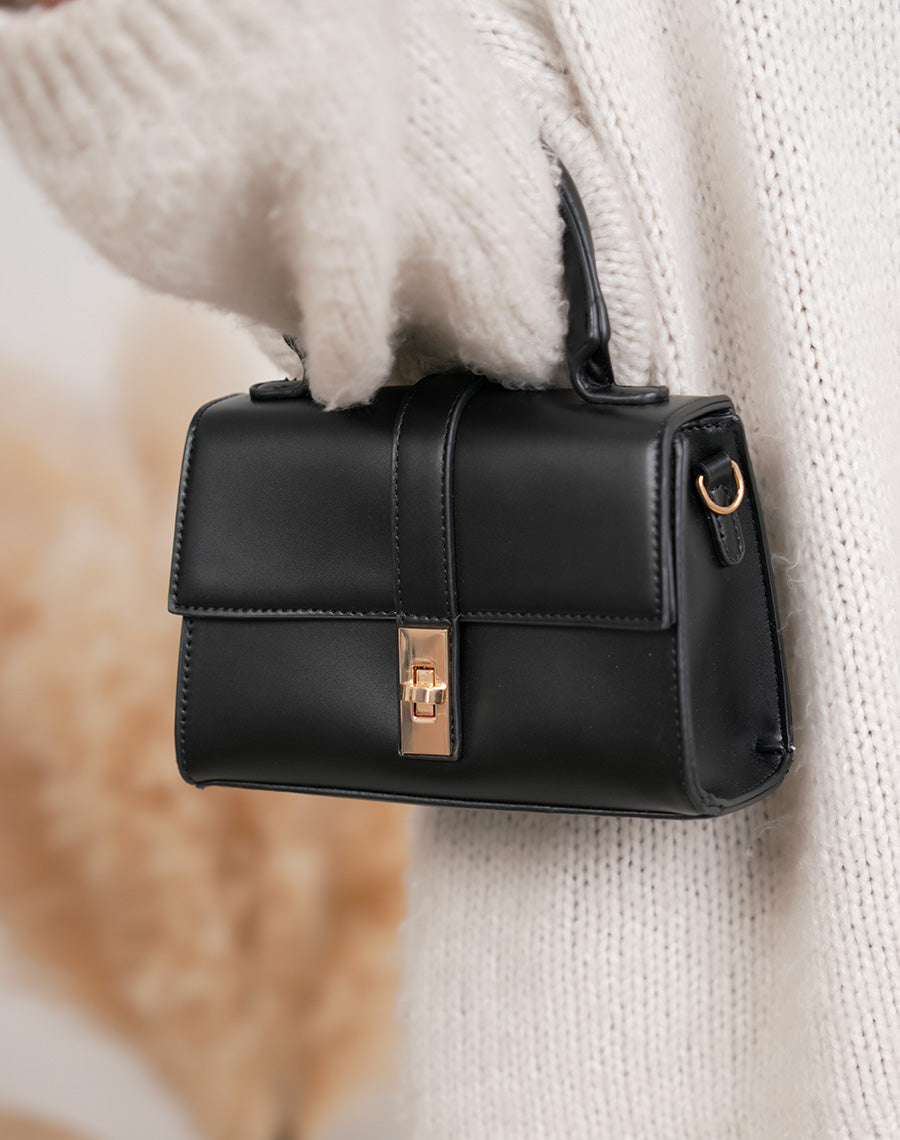 Sac à main femme noir élégant en similicuir avec fermeture tourniquet doré