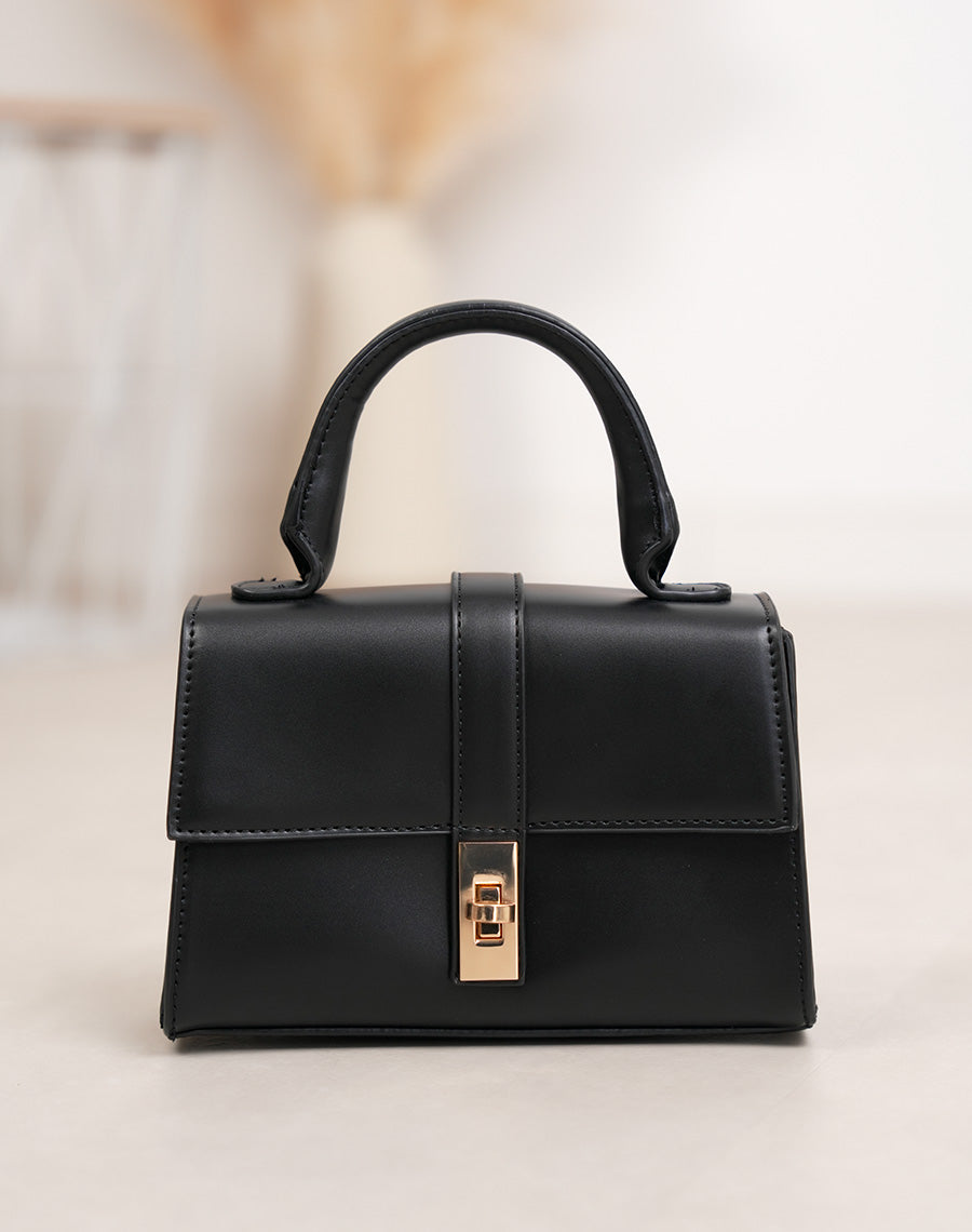 Sac à main femme noir élégant en similicuir avec fermeture tourniquet doré