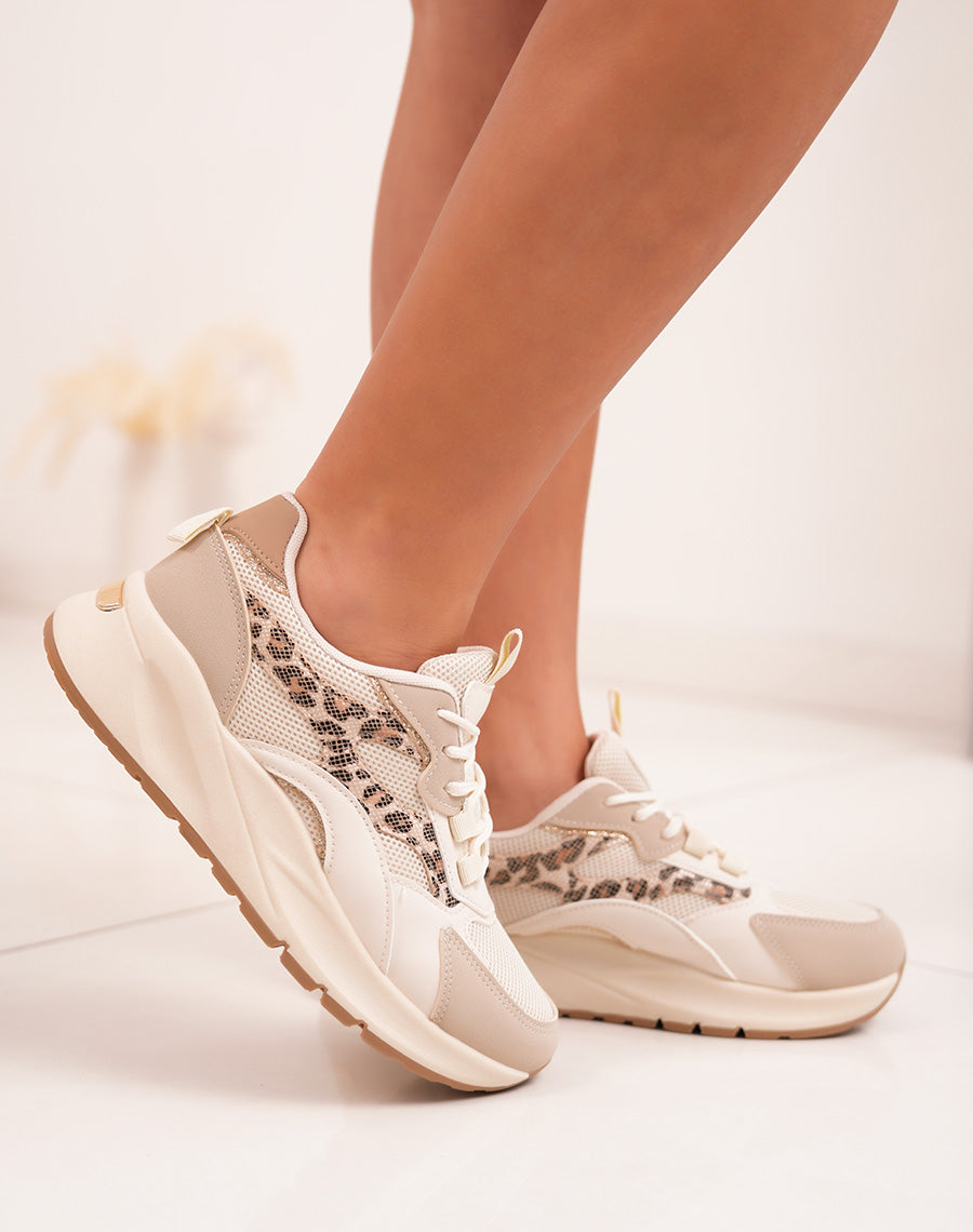 Trendy beige woman sneakers with leopard print and golden details