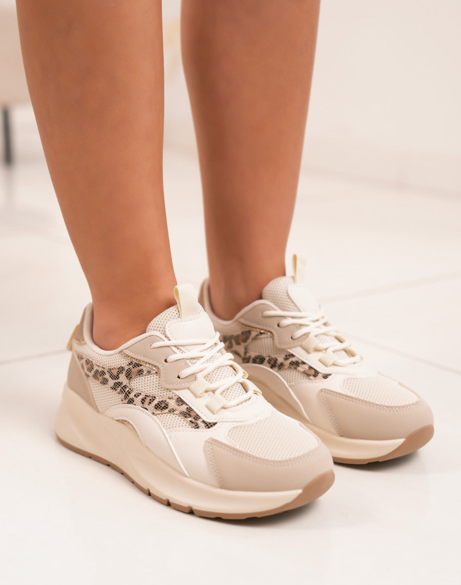 Trendy beige woman sneakers with leopard print and golden details