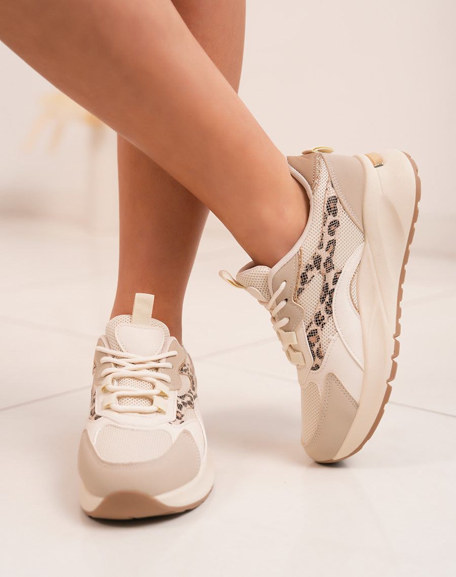 Trendy beige woman sneakers with leopard print and golden details