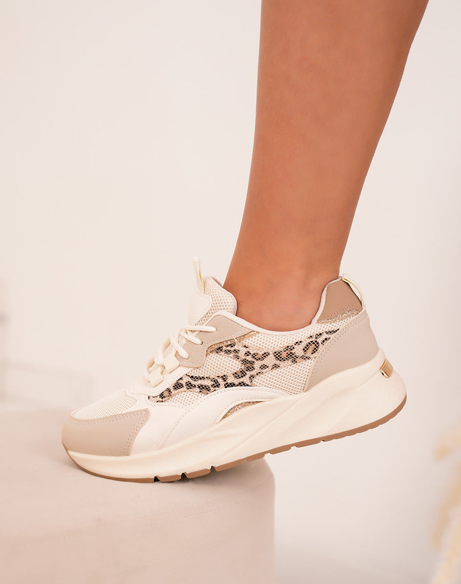 Trendy beige woman sneakers with leopard print and golden details