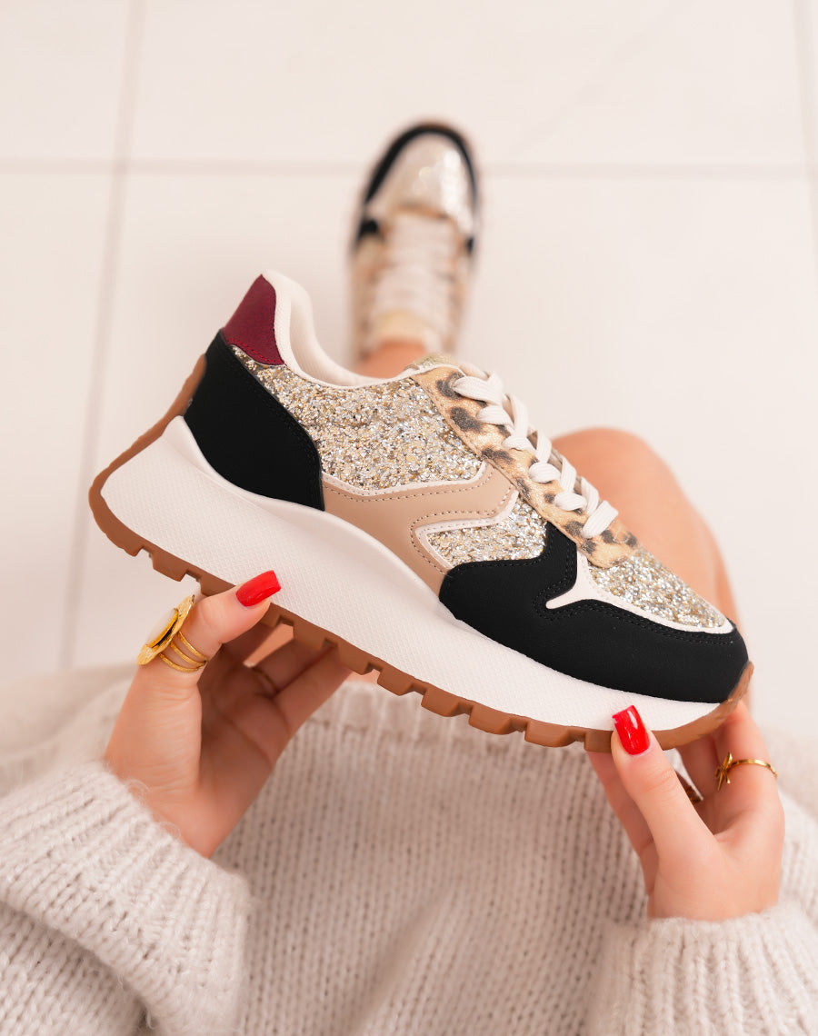 Trendy black woman sneakers with golden glitter and notched sole