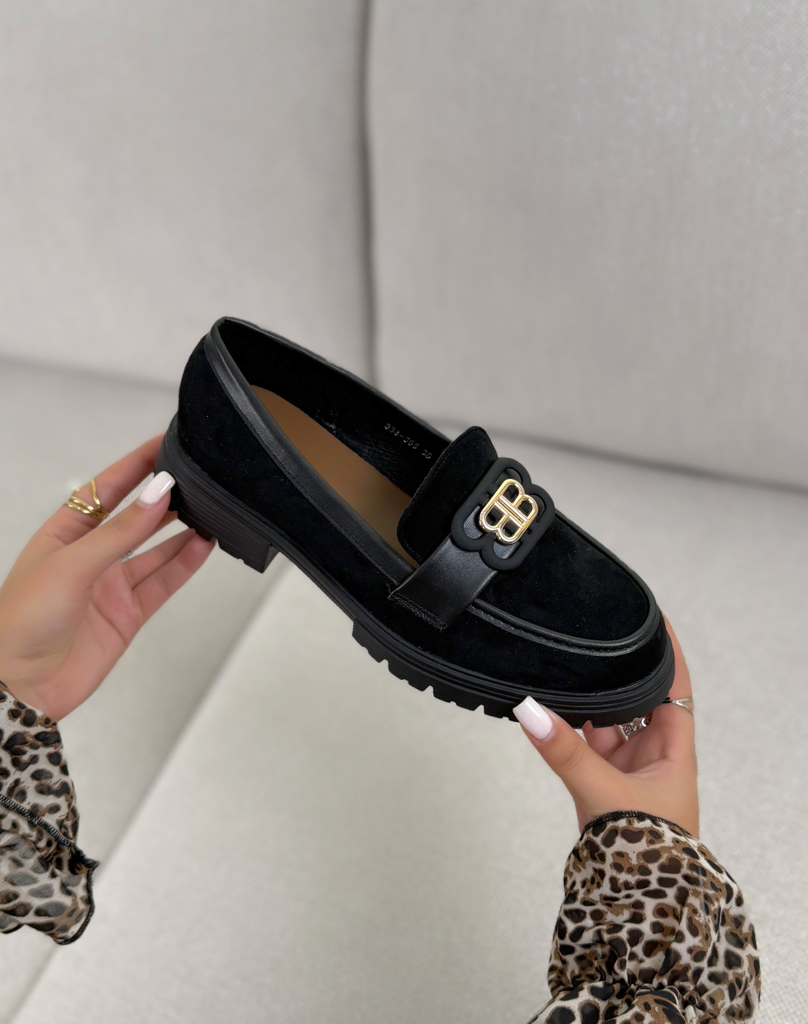Mocassins femme noirs élégants bi-matière à bijou doré