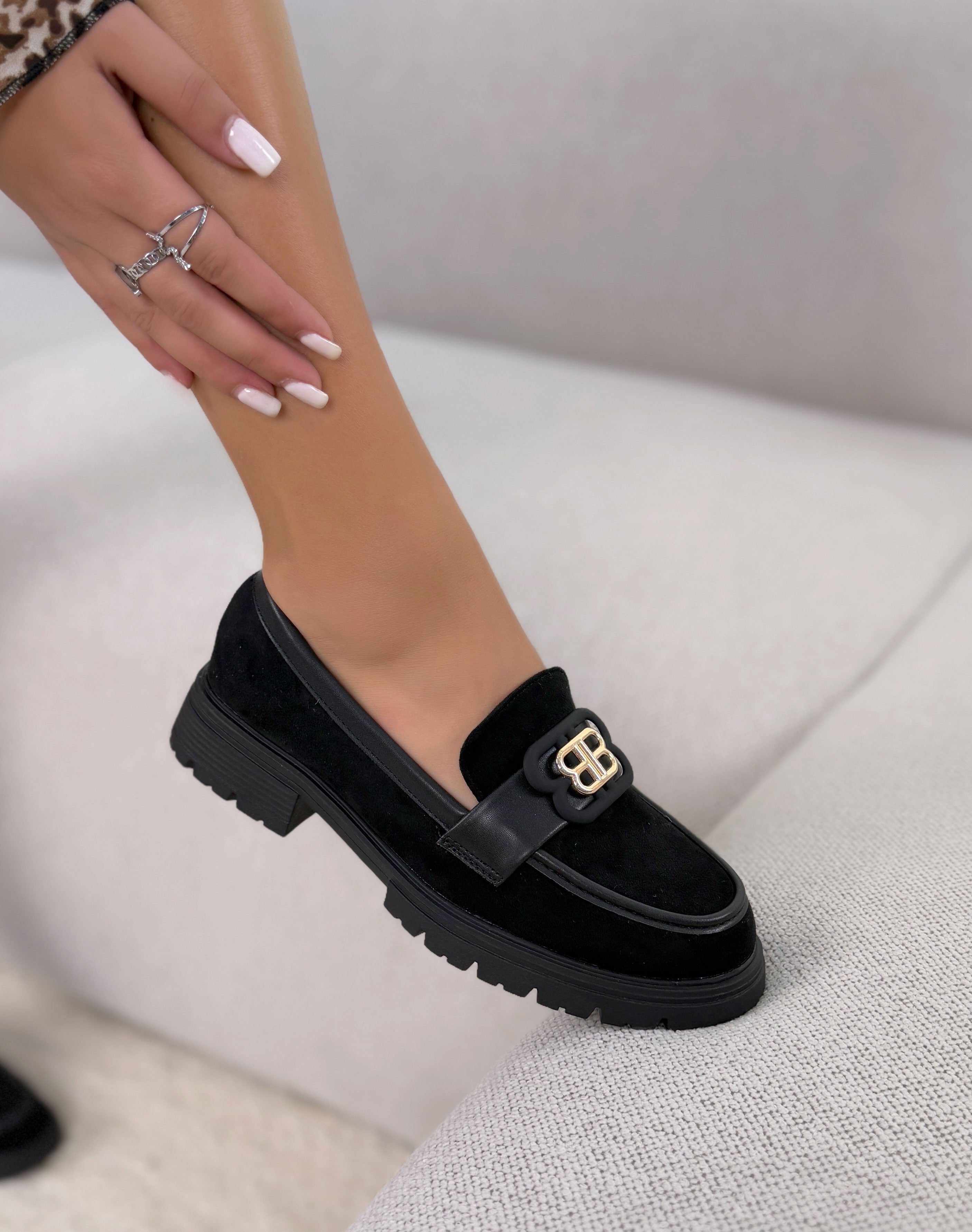 Mocassins femme noirs élégants bi-matière à bijou doré