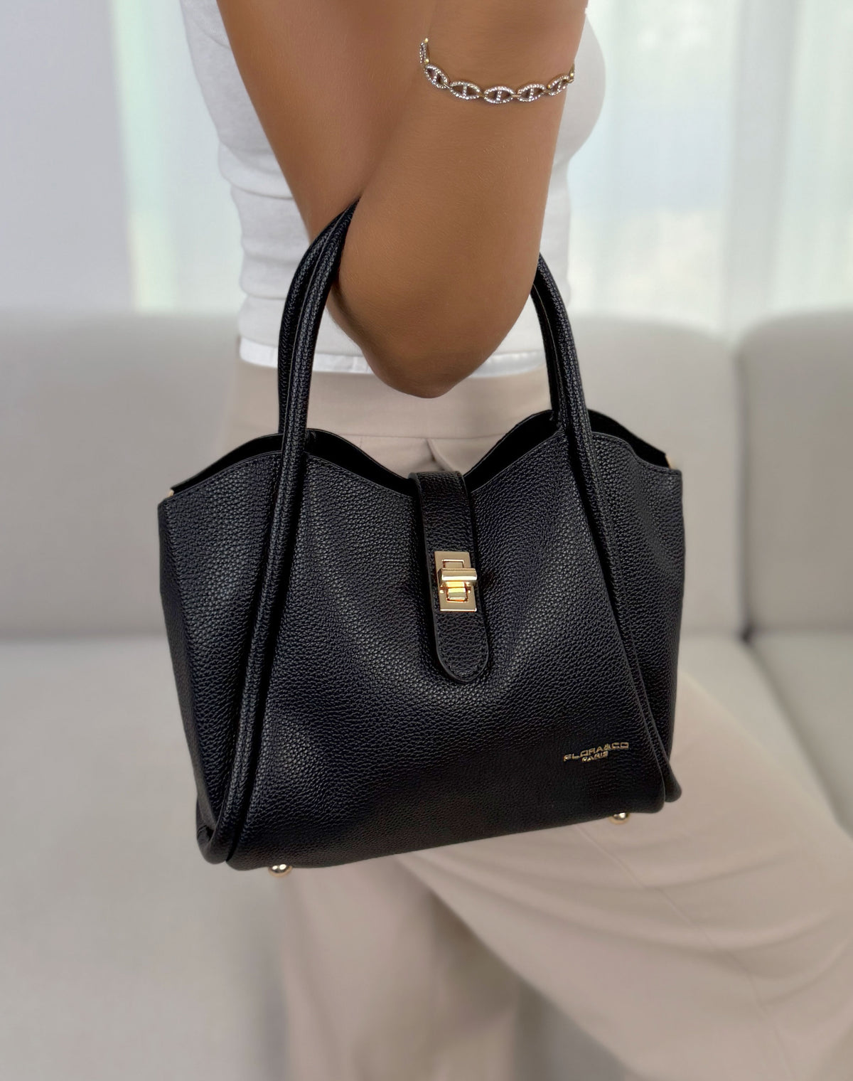 Sac à main femme noir élégant effet cuir grainé à fermoir doré