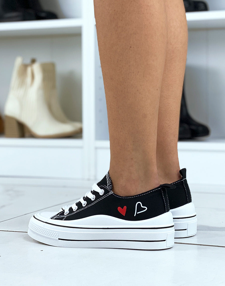 Baskets basses noires avec motifs 