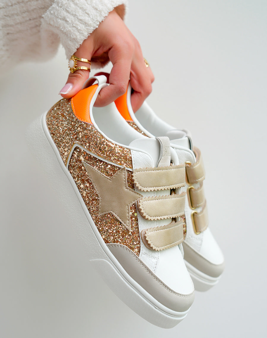 Golden female sneakers with scratch and glitter panels