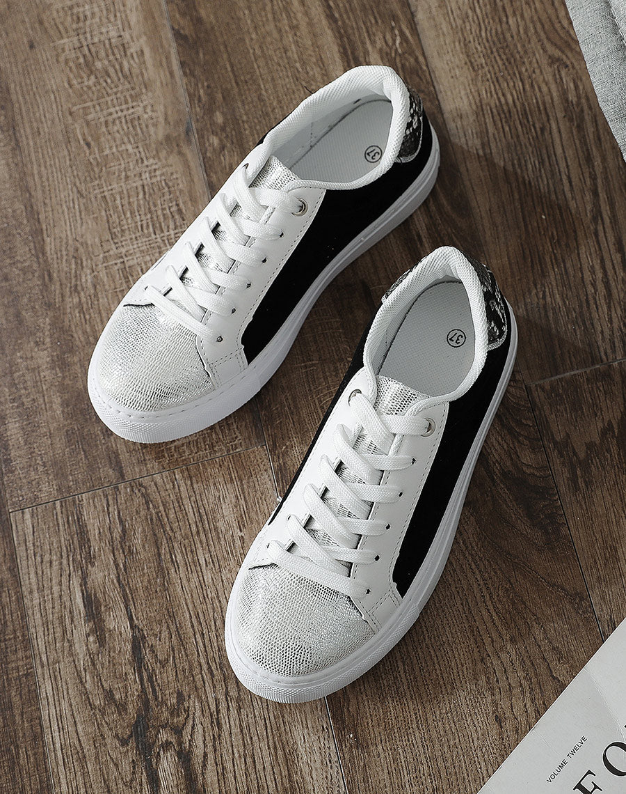 Baskets noires à empiècement argentés