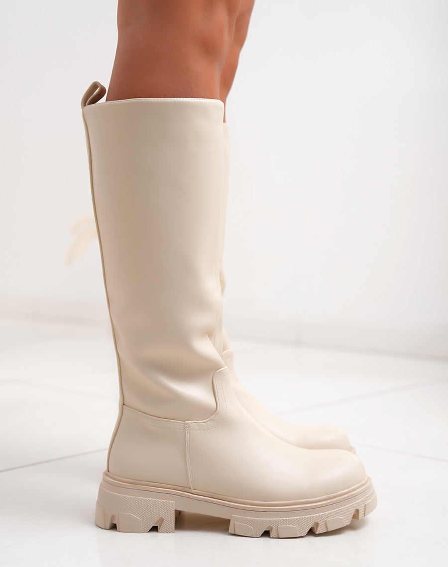 Bottes femme beiges à semelle crantée et intérieur fourré
