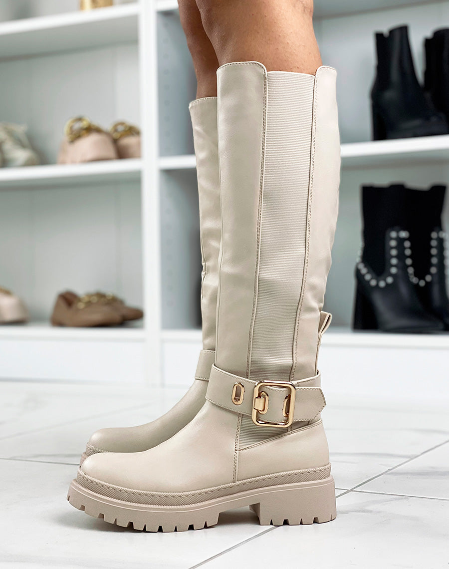 Bottes hautes beiges à boucle dorée