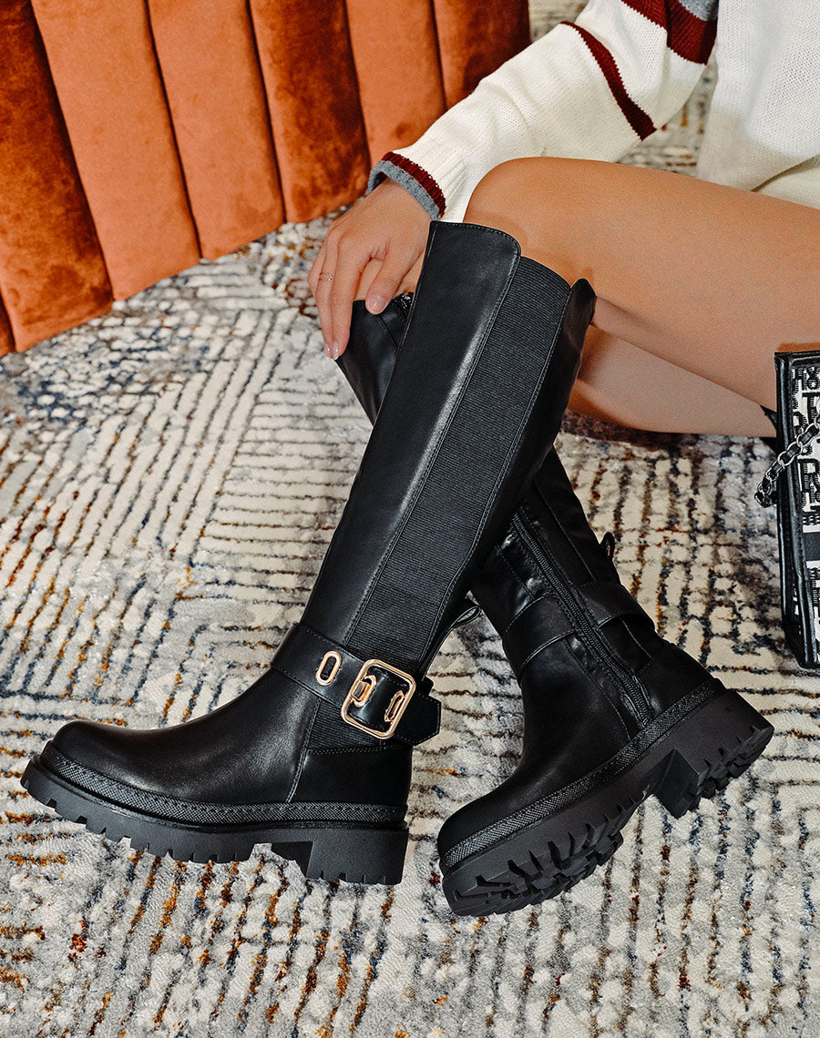 Bottes hautes noires à boucle dorée