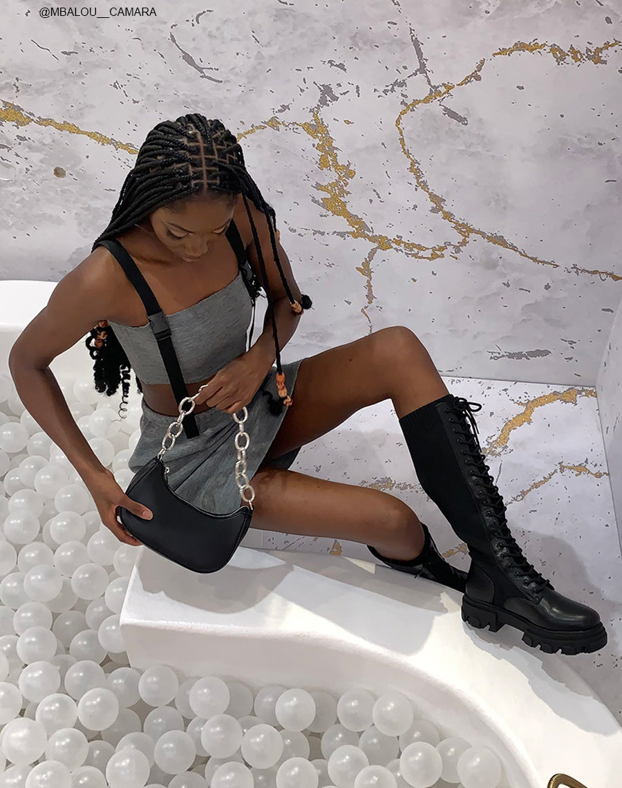 Bottes noires bi-matières lacées à semelle crantée