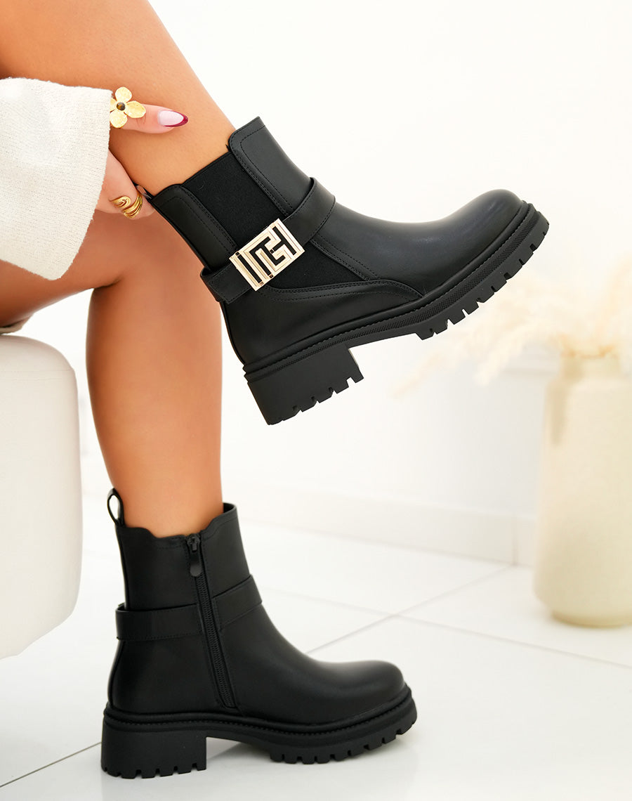 Bottines femme noires avec boucle dorée géométrique et semelle crantée