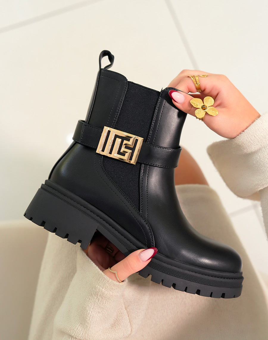 Bottines femme noires avec boucle dorée géométrique et semelle crantée