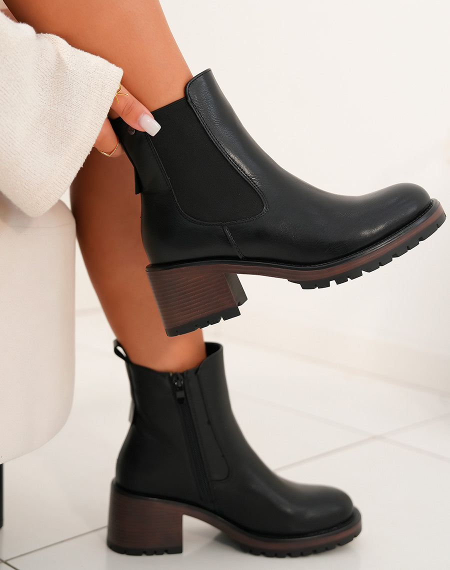 Bottines femme noires élégantes avec semelle marron et détail élastique