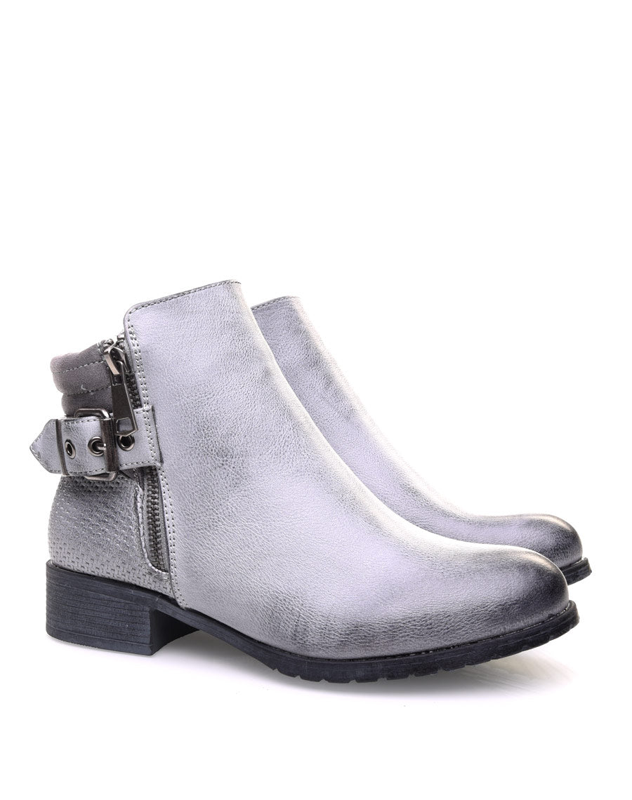 Bottines grises à talons et fermetures zippées