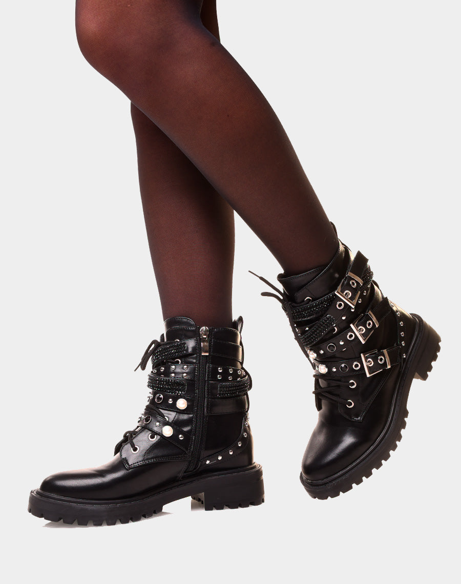 Bottines montantes noires à multiples lanières ornées de perles et de clous