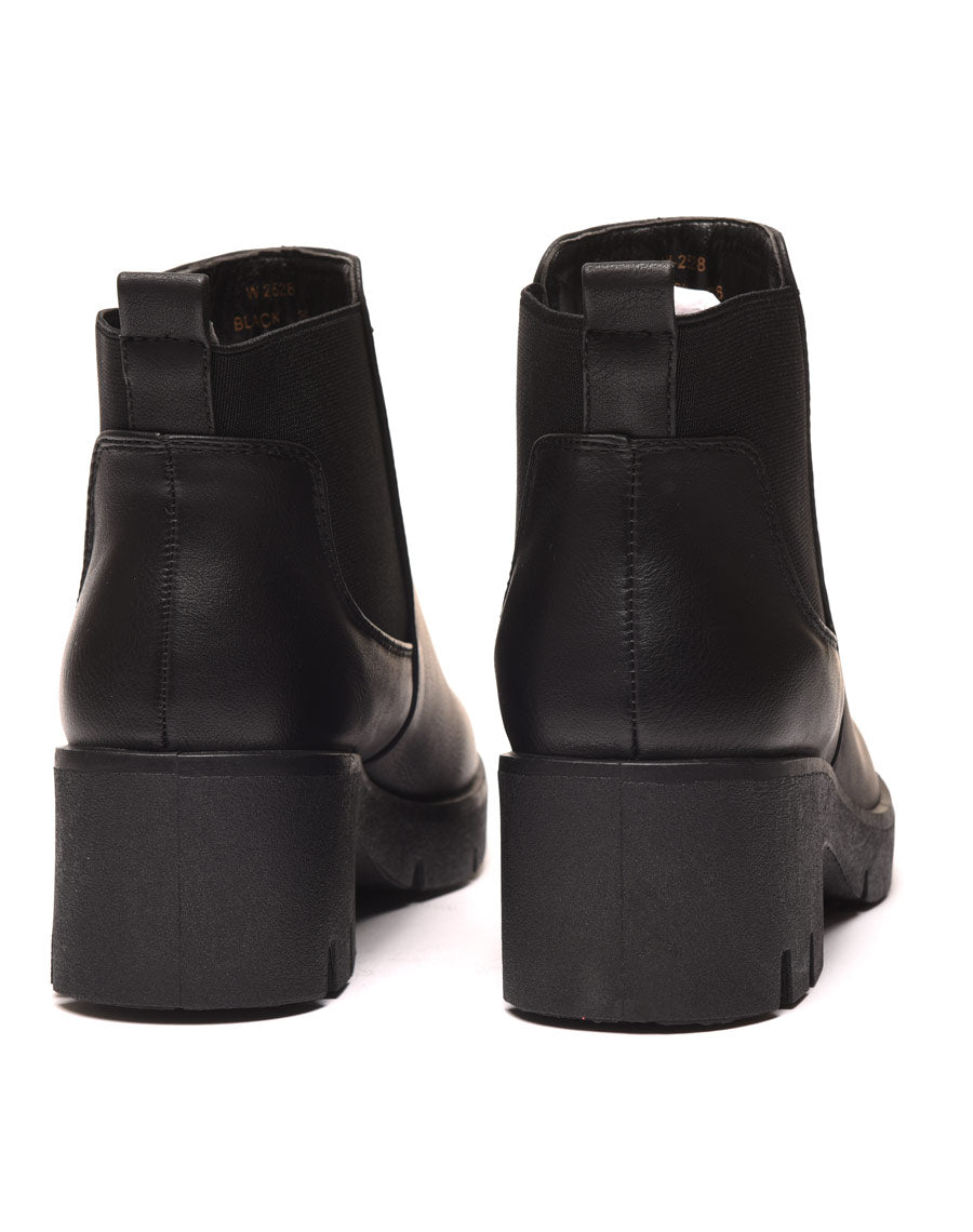 Bottines noires avec élastiques & grosse semelle crantée