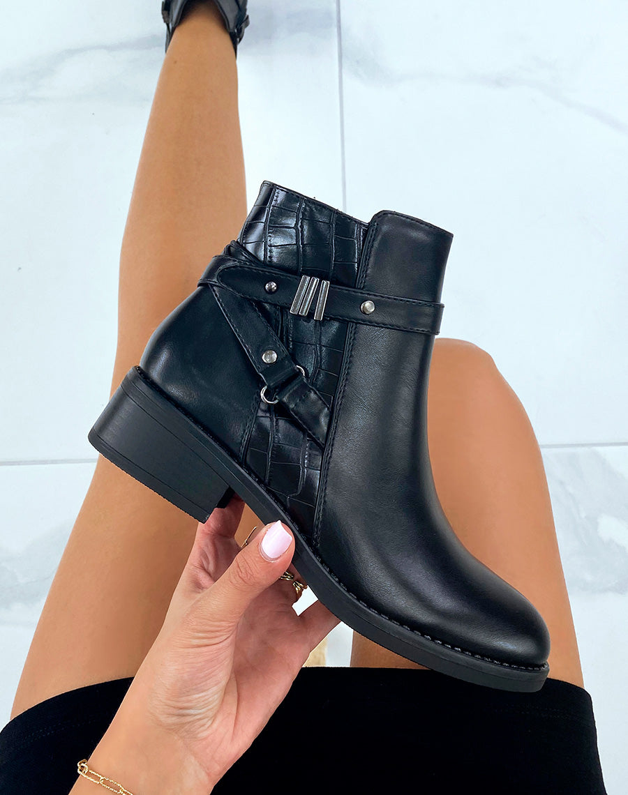 Bottines noires à brides entrecroisées et effet croco