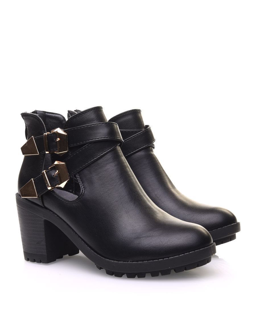 Bottines noires crantées à boucles croisées