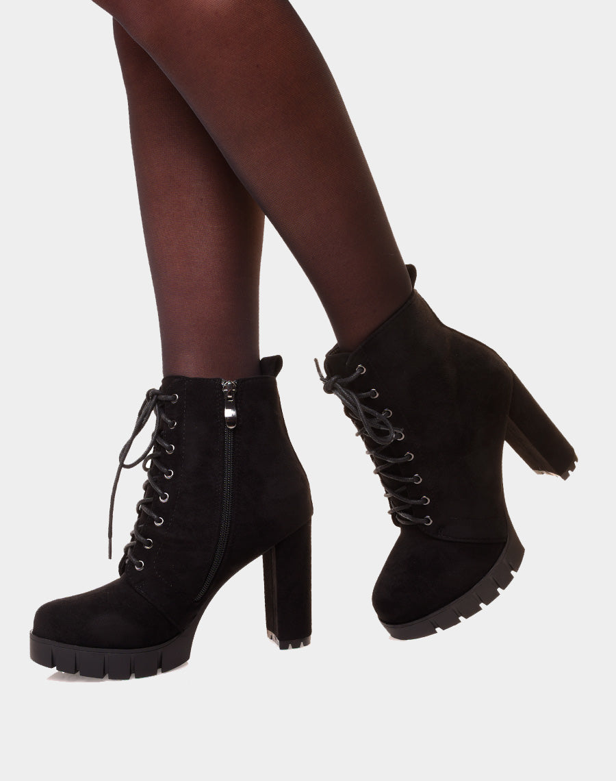 Bottines noires en suédine à talon et plateforme épaisse