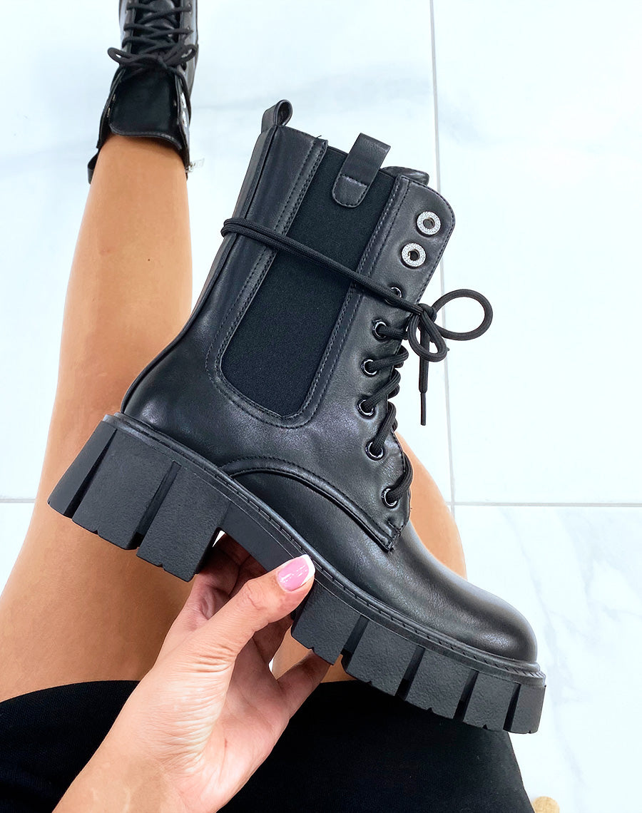 Bottines noires montantes à lacet et à zip et à détails strass