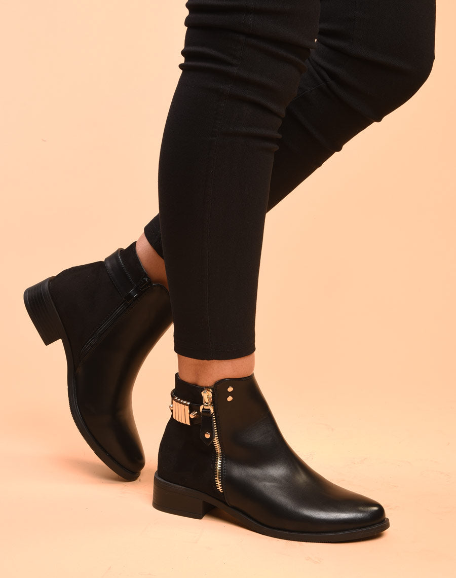 Bottines noires plates bi matières avec détails à l'arrière 