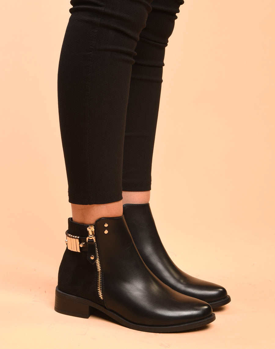 Bottines noires plates bi matières avec détails à l'arrière 