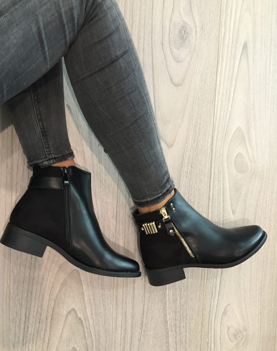 Bottines noires plates bi matières avec détails à l'arrière 