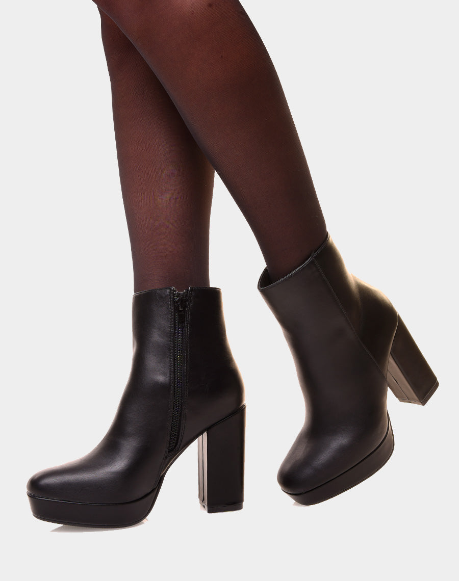 Bottines noires à talon et à grosse plateforme
