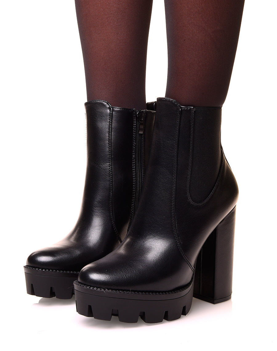 Bottines noires à talons et plateformes crantées