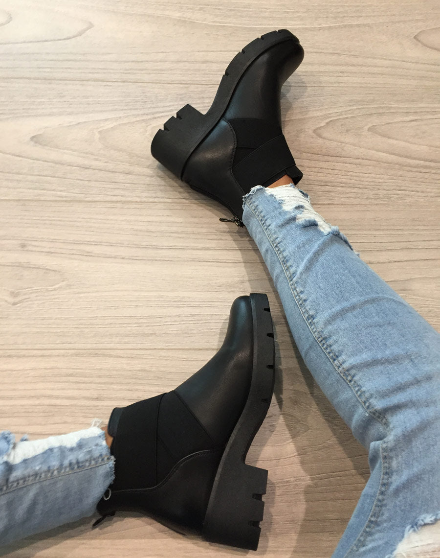 Chelsea boots noires à élastiques croisés