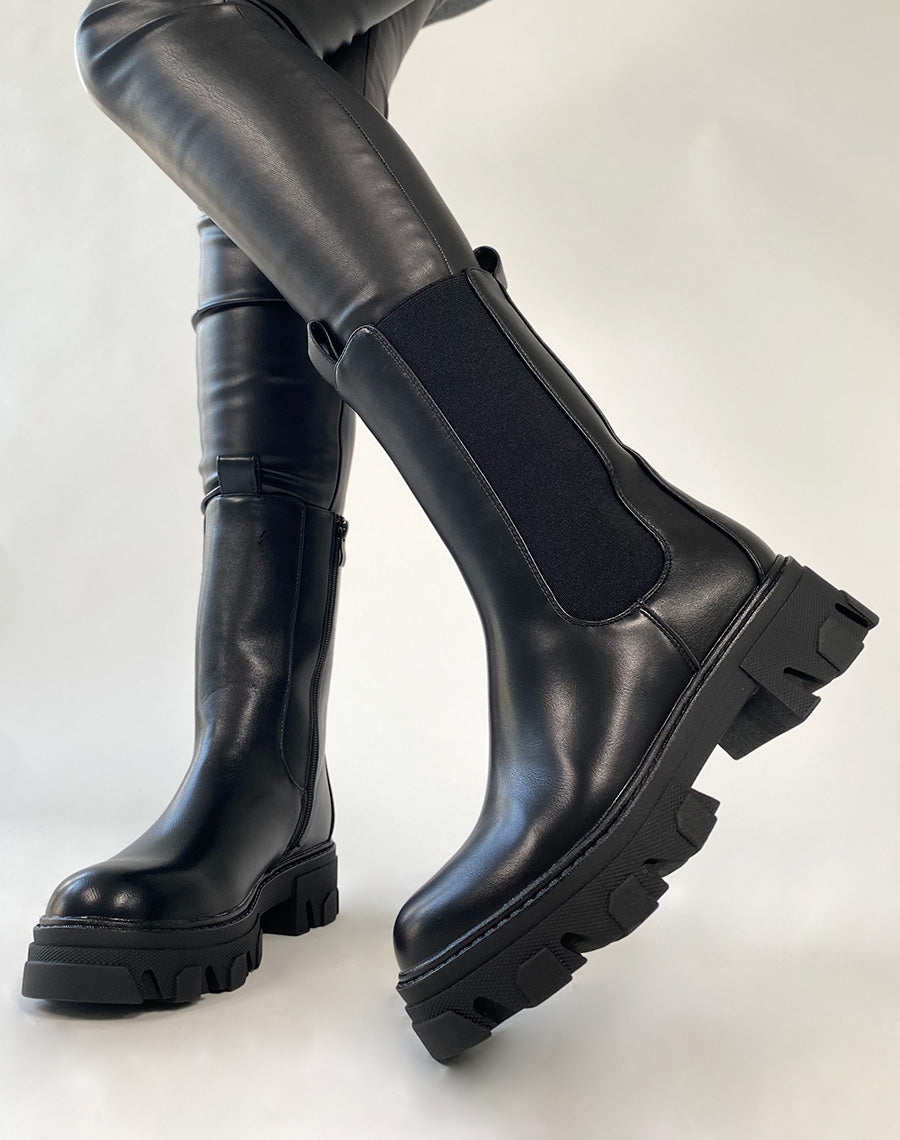 Chelsea boots noires montantes à semelle crantée