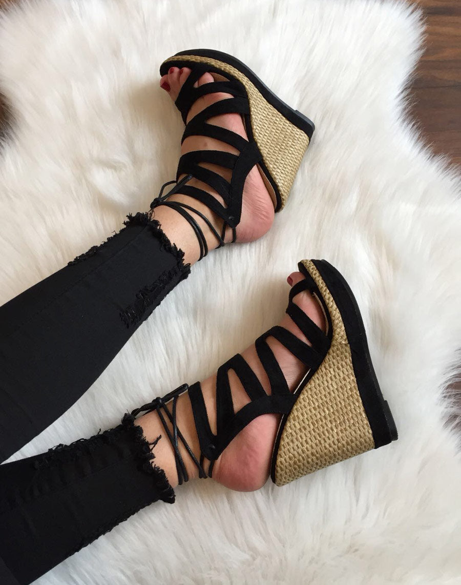 Compensées en suédine noires