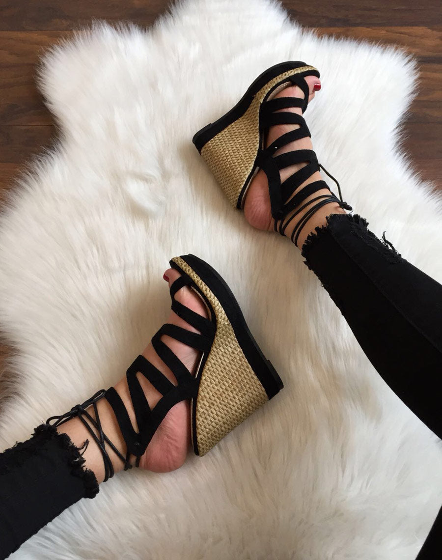 Compensées en suédine noires