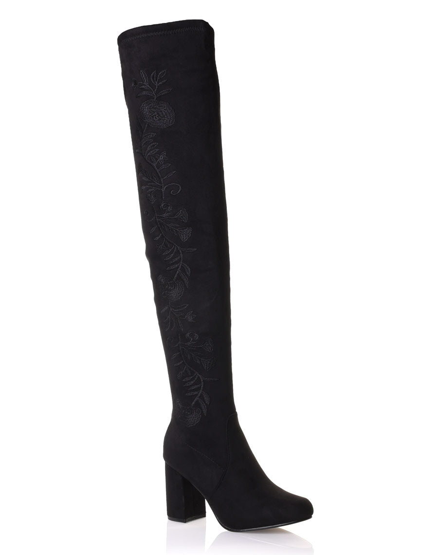 Cuissardes noires brodées à talons hauts
