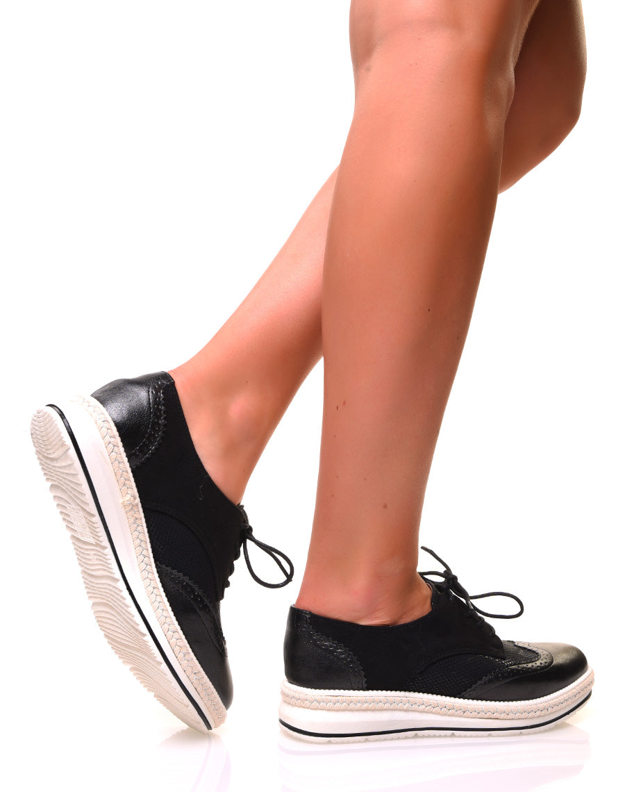 Derbies bi-matières noires aux reflets argentés à semelles compensées décorées