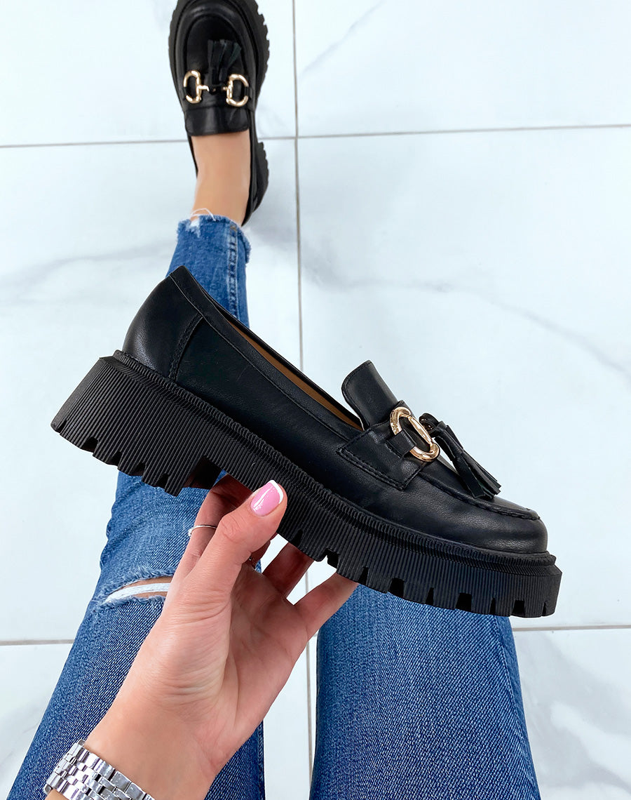Mocassins noirs à franges et détail doré