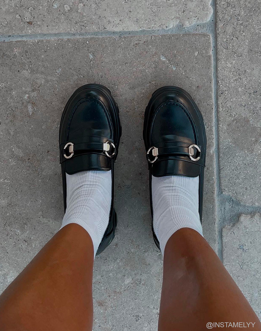 Mocassins noirs mates à détails dorés