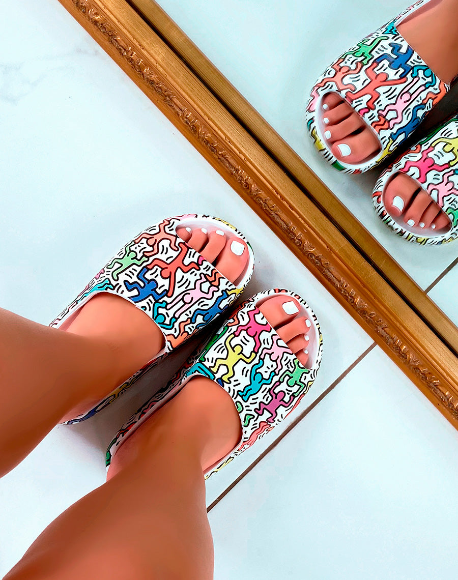 Mules blanches à motifs multicolores
