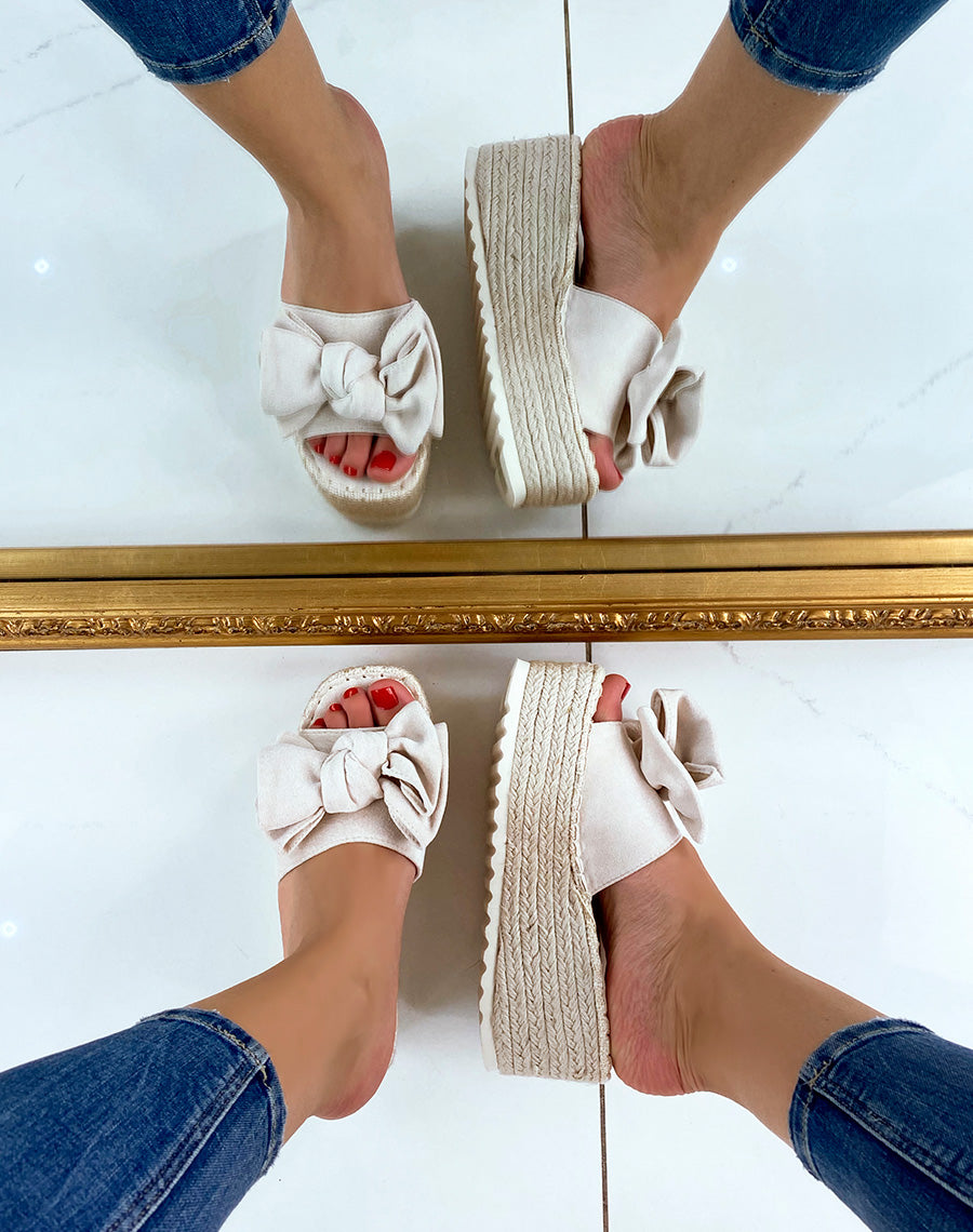 Mules compensées beiges à noeud