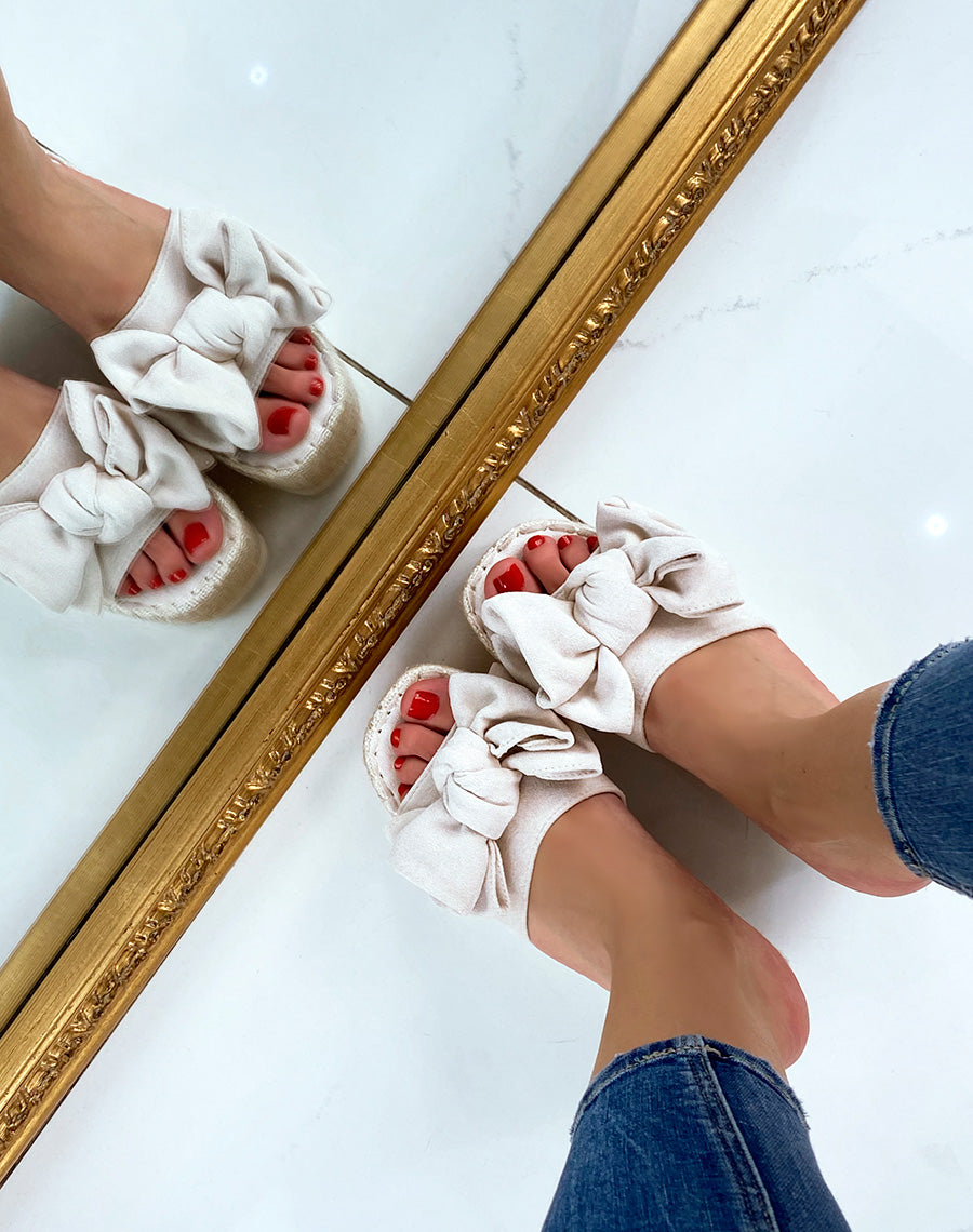 Mules compensées beiges à noeud