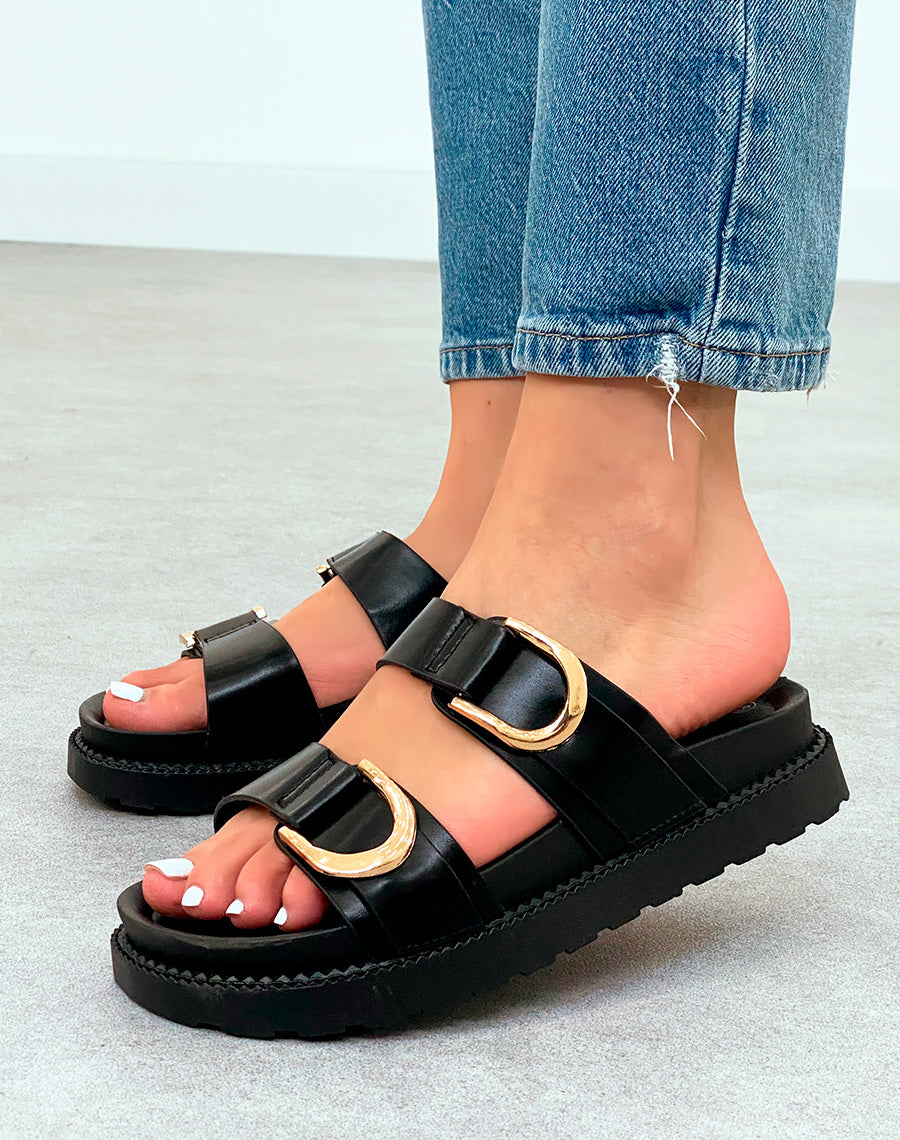 Mules Noires Classiques avec Double Sangle et Boucles Dorées – Un Essentiel Revisité