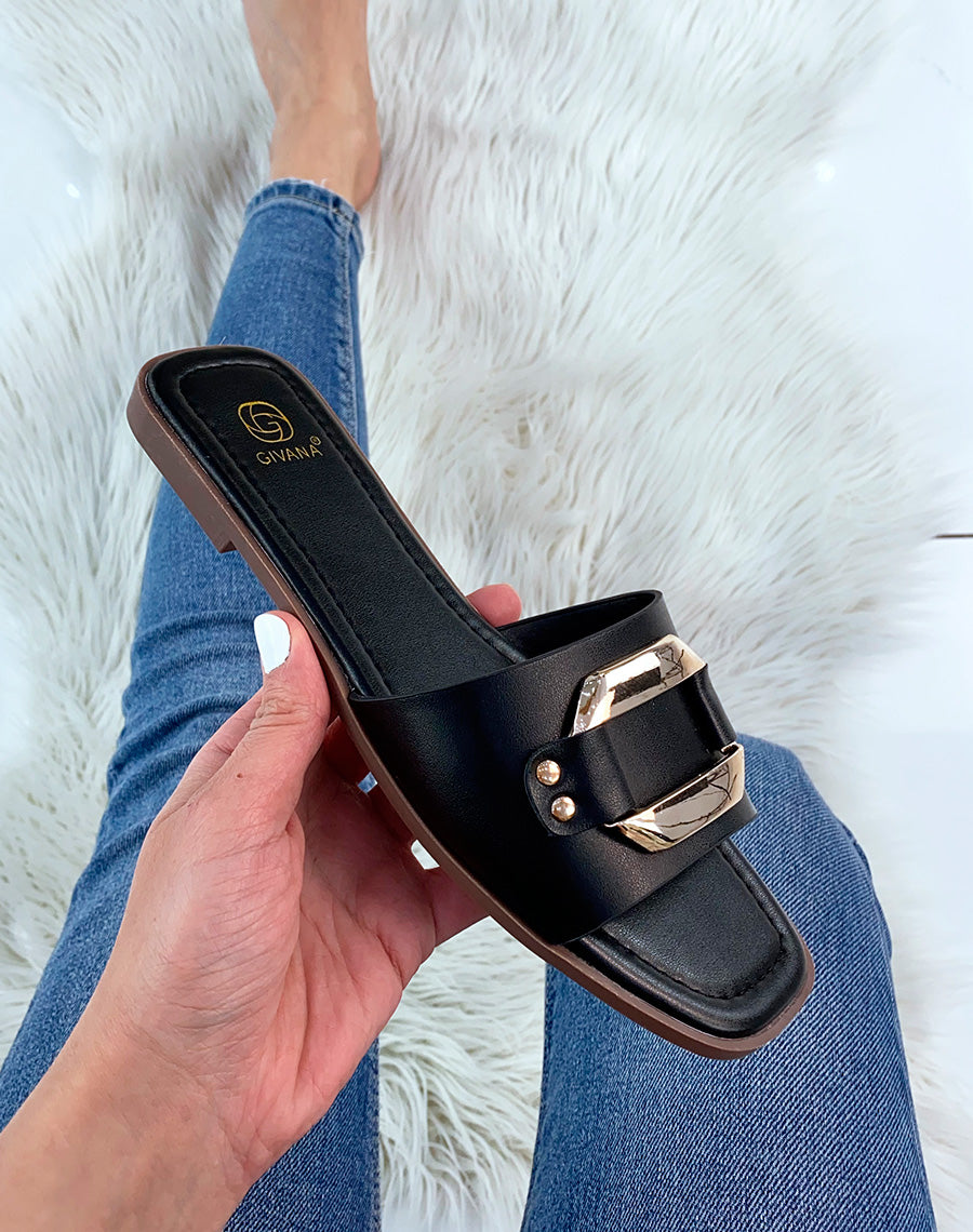 Mules noires à détail doré