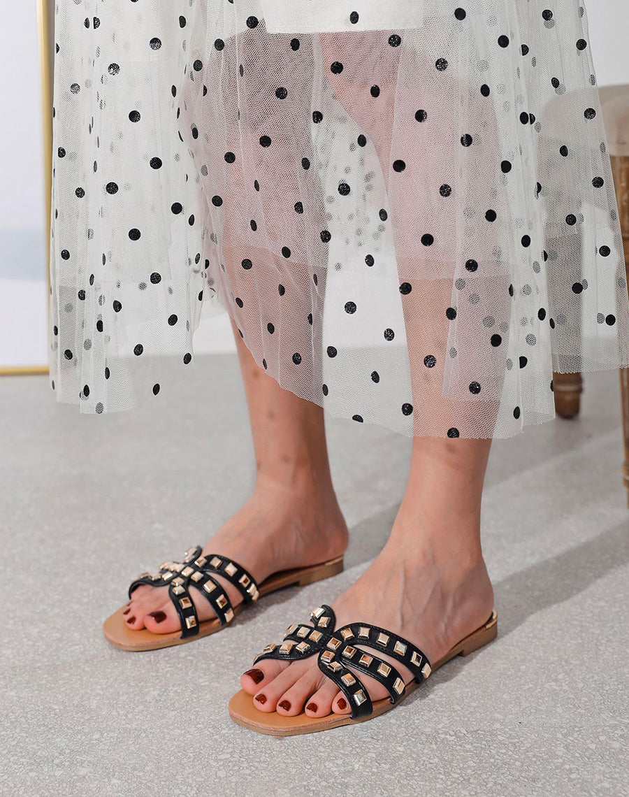 Mules noires à multiples brides ornées de clous