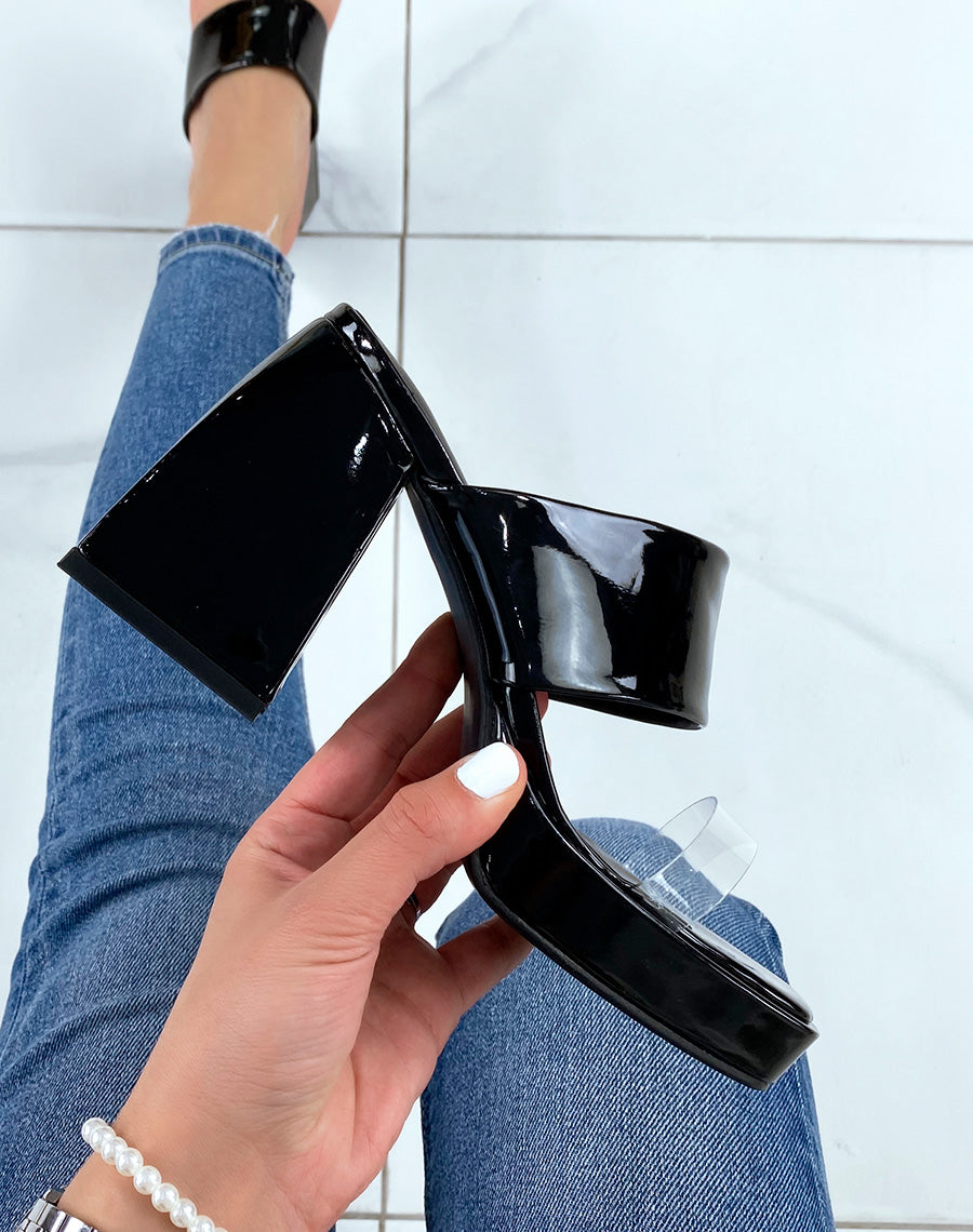 Mules noires à talon épais à brides noires et transparentes