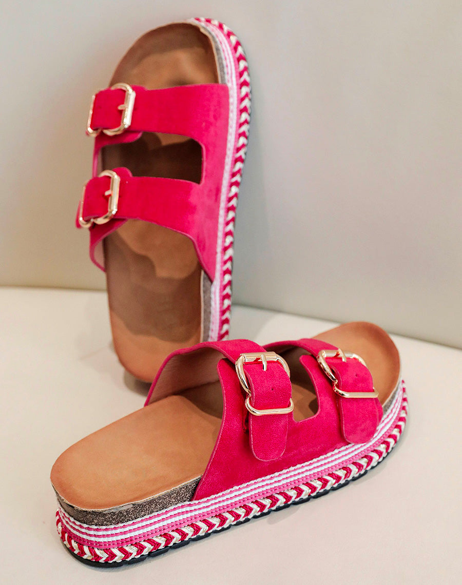 Mules plates fushia à double bride et semelle aztèque
